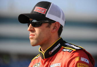 LAS VEGAS - SEPTEMBER 26: Aric Almirola, driver of the #51 Miccosukee Resort Toyota stands during qualifying for the NASCAR Camping World Truck Series Las Vegas 350 at Las Vegas Motor Speedway on September 26, 2009 in Las Vegas, Nevada. (Photo by Harry How/Getty Images)