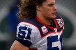 EAST RUTHERFORD, NJ - OCTOBER 18: Paul Posluszny #51 of the Buffalo Bills runs off the field following the coin toss before the game against the New York Jets on October 18, 2009 at Giants Stadium in East Rutherford, New Jersey. The Bills defeated the Jets 16-13 in overtime. (Photo by Jared Wickerham/Getty Images)