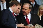 LIVERPOOL, UNITED KINGDOM - APRIL 22:  Liverpool Co-Owner Tom Hicks chats with his son prior to the UEFA Champions League Semi Final, first leg match between Liverpool and Chelsea at Anfield on April 22, 2008 in Liverpool, England.  (Photo by Shaun Botterill/Getty Images)