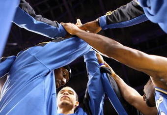 PHOENIX - DECEMBER 19:  The Washington Wizards huddles up before the NBA game against the Phoenix Suns at US Airways Center on December 19, 2009 in Phoenix, Arizona. The Suns defeated the Wizards 121-95. NOTE TO USER: User expressly acknowledges and agrees that, by downloading and or using this photograph, User is consenting to the terms and conditions of the Getty Images License Agreement.  (Photo by Christian Petersen/Getty Images)