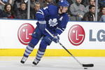TORONTO - DECEMBER 16:  Tomas Kaberle #15 of the Toronto Maple Leafs skates against the Phoenix Coyotes during their NHL game at the Air Canada Centre on October 16, 2009 in Toronto, Ontario, Canada. (Photo By Dave Sandford/Getty Images)