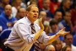 LAWRENCE, KS - DECEMBER 19:  Head coach John Beilein of the Michigan Wolverines watches reacts on the bench during the game against the Kansas Jayhawks on December 19, 2009 at Allen Fieldhouse in Lawrence, Kansas.  (Photo by Jamie Squire/Getty Images)