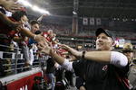 GLENDALE, AZ - JANUARY 10:  Head coach Ken Whisenhunt of the Arizona Cardinals celebrates after his team won the 2010 NFC wild-card playoff game 51-45 against the Green Bay Packers in overtime at University of Phoenix Stadium on January 10, 2010 in Glendale, Arizona.  (Photo by Christian Petersen/Getty Images)