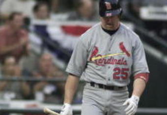 9 Oct 2001:  Mark McGwire #25 of the St. Louis Cardinals grimaces after striking out against the Arizona Diamondbacks during game one of the National League West Divisional Series at Bank One Ballpark in Phoenix, Arizona. The Diamondbacks win 1-0 over the Cardinals. DIGITAL IMAGE Mandatory Credit: Jed Jacobsohn/ALLSPORT