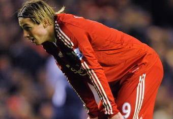 LIVERPOOL, ENGLAND - DECEMBER 13:   Fernando Torres of Liverpool catches his breath during the Barclays Premier League match between Liverpool and Arsenal at Anfield on December 13, 2009 in Liverpool, England. (Photo by Michael Regan/Getty Images)