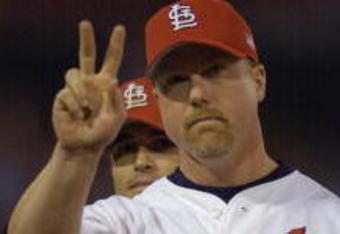 12 Oct 2001: Mark McGwire #25 of the St.Louis Cardinals salutes the crowd during team introductions before their game against the Arizona Diamondbacks at Busch Stadium in St. Louis, Missouri. DIGITAL IMAGE. Mandatory Credit: Elsa/ALLSPORT