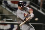 9 Oct 2001:  Mark McGwire #25 of the St. Louis Cardinals swings at a pitch during game one of the National League West Divisional Series against the Arizona Diamondbacks at Bank One Ballpark in Phoenix, Arizona. The Diamondbacks win 1-0 over the Cardinals. DIGITAL IMAGE Mandatory Credit: Jed Jacobsohn/ALLSPORT