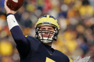 ANN ARBOR, MI - NOVEMBER 04:  Quarterback Chad Henne #7 of the Michigan Wolverines warms up after halftime against the Ball State Cardinals on November 4, 2006 at Michigan Stadium in Ann Arbor, Michigan.  Michigan won 34-26.  (Photo by Brian Bahr/Getty Images)