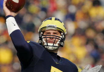 ANN ARBOR, MI - NOVEMBER 04:  Quarterback Chad Henne #7 of the Michigan Wolverines warms up after halftime against the Ball State Cardinals on November 4, 2006 at Michigan Stadium in Ann Arbor, Michigan.  Michigan won 34-26.  (Photo by Brian Bahr/Getty Images)