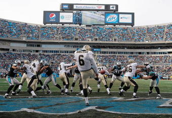 CHARLOTTE, NC - JANUARY 03:  Thomas Morstead #6 of the New Orleans Saints punts the ball against the Carolina Panthers during the game at Bank of America Stadium on January 3, 2010 in Charlotte, North Carolina.  (Photo by Streeter Lecka/Getty Images)