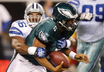 ARLINGTON, TX - JANUARY 09:  Quarterback Donovan McNabb #5 of the Philadelphia Eagles is sacked by Bradie James #56 of the Dallas Cowboys during the 2010 NFC wild-card playoff game at Cowboys Stadium on January 9, 2010 in Arlington, Texas.  (Photo by Ronald Martinez/Getty Images)