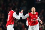 LONDON - FEBRUARY 11:  Philippe Senderos (R) of Arsenal celebrates with team mate Emmanuel Adebayor (L) after opening the scoring during the Barclays Premier League match between Arsenal and Blackburn Rovers at the Emirates Stadium on February 11, 2008 in London, England.  (Photo by Clive Mason/Getty Images)