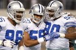 ARLINGTON, TX - JANUARY 9:  Linebacker Bradie James #56 and Jay Ratliff #90 of the Dallas Cowboys during the 2010 NFC wild-card playoff game at Cowboys Stadium on January 9, 2010 in Arlington, Texas. (Photo by Ronald Martinez/Getty Images) 