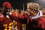 SAN FRANCISCO - DECEMBER 26: Head coach Pete Carroll and Damian Williams #18 of the USC Trojans celebrate after defeating the Boston College Eagles during the 2009 Emerald Bowl at AT&T Park on December 26, 2009 in San Francisco, California. (Photo by Jed Jacobsohn/Getty Images)