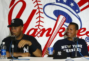 TAMPA, FL - FEBRUARY 24:  Alex Rodriguez #13 and Derek Jeter #2 of the New York Yankees during a press conference after practice on February 24, 2004 at the Yankees spring training complex in Tampa, Florida.  (Photo by Ezra Shaw/Getty Images)