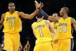 LOS ANGELES, CA - JANUARY 05:  Andrew Bynum #17, Kobe Bryant #24, Jordan Farmar #1 and Shannon Brown #12 of the Los Angeles Lakers celebrate a score on way to an 88-79 win over the Houston Rockets during the second half at Staples Center on January 5, 2010 in Los Angeles, California.  NOTE TO USER: User expressly acknowledges and agrees that, by downloading and/or using this Photograph, user is consenting to the terms and conditions of the Getty Images License Agreement.  (Photo by Harry How/Getty Images)