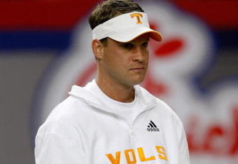 ATLANTA - DECEMBER 31:  Tennessee Volunteers head coach Lane Kiffin watches warmups on the field before the Chick-Fil-A Bowl against the Virginia Tech Hokies at the Georgia Dome on December 31, 2009 in Atlanta, Georgia.  Virginia Tech beat Tennessee 37-14.  (Photo by Mike Zarrilli/Getty Images)