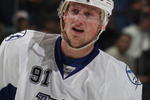 UNIONDALE, NY - DECEMBER 21: Steven Stamkos #91 of the Tampa Bay Lightning skates against the New York Islanders at the Nassau Coliseum on December 21, 2009 in Uniondale, New York.  (Photo by Bruce Bennett/Getty Images)