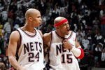 EAST RUTHERFORD, NJ - APRIL 28:  Vince Carter #15 of the New Jersey Nets celebrates his game-tying shot at the buzzer with teammate Richard Jefferson #24 at the end of the first overtime against the Miami Heat in Game three of the Eastern Conference Quarterfinals during the 2005 NBA Playoffs at Continental Airline Arena on April 28, 2005 in East Rutherford, New Jersey.  NOTE TO USER: User expressly acknowledges and agrees that, by downloading and/or using this Photograph, user is consenting to the terms and conditions of the Getty Images License Agreement.  (Photo by Jim McIsaac/Getty Images)