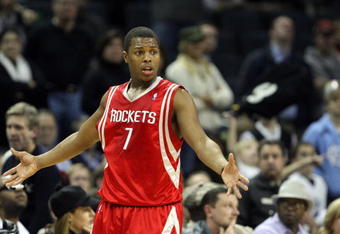 CHARLOTTE, NC - JANUARY 12:  Kyle Lowry #7 of the Houston Rockets reacts to a call against the Charlotte Bobcats at Time Warner Cable Arena on January 12, 2010 in Charlotte, North Carolina.  NOTE TO USER: User expressly acknowledges and agrees that, by downloading and/or using this Photograph, User is consenting to the terms and conditions of the Getty Images License Agreement.  (Photo by Streeter Lecka/Getty Images)