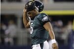 ARLINGTON, TX - JANUARY 9:  Quarterback Donovan McNabb #5 of the Philadelphia Eagles walks off the field after not converting on fourth down in the second half during the 2010 NFC wild-card playoff game against the Dallas Cowboys at Cowboys Stadium on January 9, 2010 in Arlington, Texas. (Photo by Jamie Squire/Getty Images)