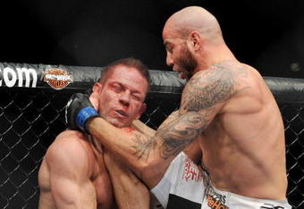 LAS VEGAS - NOVEMBER 21: Ben Saunders (R) battles Marcus Davis (L) during their Welterweight Fight at the UFC 106 at Mandalay Bay Events Center on November 21, 2009 in Las Vegas, Nevada. (Photo by Jon Kopaloff/Getty Images)