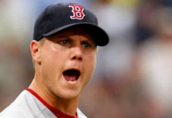 ATLANTA - JUNE 27:  Relief pitcher Jonathan Papelbon #58 of the Boston Red Sox reacts after defeating the Atlanta Braves 1-0 at Turner Field on June 27, 2009 in Atlanta, Georgia.  (Photo by Kevin C. Cox/Getty Images)