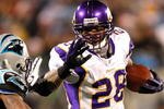 CHARLOTTE, NC - DECEMBER 20:  Adrian Peterson #28 of the Minnesota Vikings rushes upfield against Captain Munnerlyn #41 of the Carolina Panthers at Bank of America Stadium on December 20, 2009 in Charlotte, North Carolina.  (Photo by Kevin C. Cox/Getty Images)