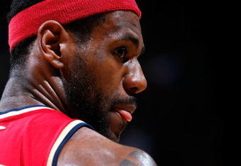 ATLANTA - DECEMBER 29:  LeBron James #23 of the Cleveland Cavaliers looks over at the bench of the Atlanta Hawks at Philips Arena on December 29, 2009 in Atlanta, Georgia.  NOTE TO USER: User expressly acknowledges and agrees that, by downloading and/or using this Photograph, User is consenting to the terms and conditions of the Getty Images License Agreement.  (Photo by Kevin C. Cox/Getty Images)
