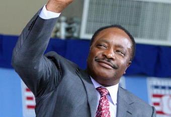 COOPERSTOWN, NY - JULY 26:  Hall of Famer Joe Morgan waves to the crowd as he is introduced at Clark Sports Center during the 2009  Baseball Hall of Fame induction ceremony on July 26, 2009 in Cooperstown, New York.  (Photo by Jim McIsaac/Getty Images)