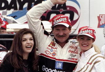 DAYTONA BEACH - FEBRUARY 15:  Dale Earnhardt Sr. driver of the #3 GM Goodwrench Chevrolet and wife Teresa celebrate victory with the trophy after the Nascar Daytona 500 on February 15, 1998 at the Daytona International Speedway in Daytona Beach, Florida. (Photo by David Taylor/Getty Images)