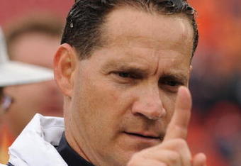 TAMPA, FL - JANUARY 1: Coach Gene Chizik of the Auburn Tigers leaves the field with a win against the Northwestern Wildcats in the Outback Bowl January 1, 2010 at Raymond James Stadium in Tampa, Florida.  (Photo by Al Messerschmidt/Getty Images) 