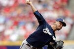 CINCINNATI - JULY 19:  Yovani Gallardo #49 of the Milwaukee Brewers throws a pitch during the game against the Cincinnati Reds at Great American Ball Park on July 19, 2009 in Cincinnati, Ohio.  (Photo by Andy Lyons/Getty Images)