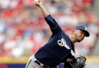 CINCINNATI - JULY 19:  Yovani Gallardo #49 of the Milwaukee Brewers throws a pitch during the game against the Cincinnati Reds at Great American Ball Park on July 19, 2009 in Cincinnati, Ohio.  (Photo by Andy Lyons/Getty Images)