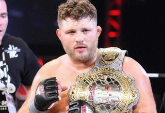 UNCASVILLE, CT - MAY 16:  Roy Nelson (White Trunks) of the Lions Den celebrates after beating Brad Imes of the MilesTech Fighting System during their bout presented by the International Fighting League at the Mohegan Sun Arena May 16, 2008 in Uncasville, Connecticut.  (Photo by Al Bello/Getty Images)