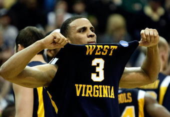 WASHINGTON - MARCH 22:  Joe Mazzulla #3 of the West Virginia Mountaineers celebrates after defeating the Duke Blue Devils during the second round of the West Regional as part of the 2008 NCAA Men's Basketball Tournament at the Verizon Center on March 22, 2008 in Washington, DC.  (Photo by Win McNamee/Getty Images)
