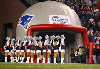 FOXBORO, MA - OCTOBER 20 Cheerleaders of the New England Patriots line the field before a game with the Denver Broncos at Gillette Stadium on October 20, 2008 in Foxboro, Massachusetts. The Paytiots won 41-7. (Photo by Jim Rogash/Getty Images)