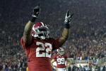 PASADENA, CA - JANUARY 07:  Running back Mark Ingram #22 of the Alabama Crimson Tide celebrates after an extra point during the Citi BCS National Championship game against the Texas Longhorns at the Rose Bowl on January 7, 2010 in Pasadena, California. The Crimson Tide defeated the Longhorns 37-21.  (Photo by Stephen Dunn/Getty Images)