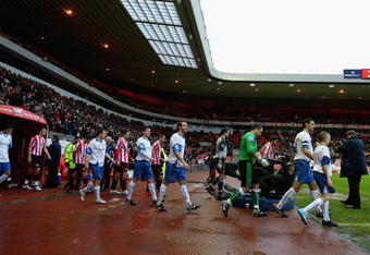 SUNDERLAND, ENGLAND - JANUARY 02: Captain of Barrow AFC Phil Bolland leads his team out against  Sunderland during the FA Cup sponsored by E.ON 3rd Round match between Sunderland and Barrow AFC played at the Stadium of Light on January 2, 2010 in Sunderland, England.  (Photo by Clive Brunskill/Getty Images)