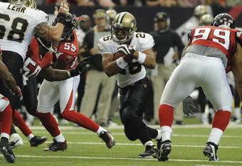 ATLANTA - NOVEMBER 9: Running back Deuce McAllister #26 of the New Orleans Saints rushes upfield against the Atlanta Falcons at the Georgia Dome on November 9, 2008 in Atlanta, Georgia.  (Photo by Al Messerschmidt/Getty Images) 