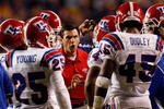 BATON ROUGE, LA - NOVEMBER 14:  Head coach Derek Dooley of the Louisiana Tech Bulldogs talks with his team during a time out in the game against the LSU Tigers at Tiger Stadium on November 14, 2009 in Baton Rouge, Louisiana.  The Tigers defeated the Bulldogs 24-16.  (Photo by Chris Graythen/Getty Images)