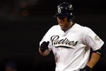 SAN DIEGO, CA - SEPTEMBER 30:  Kevin Kouzmanoff #5 of the San Diego Padres rounds the bases after his three-run homerun during the bottom of the third inning of the MLB game between the Los Angeles Dodger and the San Diego Padres at Petco Park on September 30, 2009 in San Diego, California. (Photo by Donald Miralle/Getty Images)