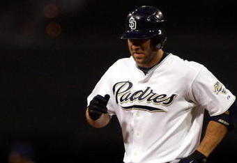 SAN DIEGO, CA - SEPTEMBER 30:  Kevin Kouzmanoff #5 of the San Diego Padres rounds the bases after his three-run homerun during the bottom of the third inning of the MLB game between the Los Angeles Dodger and the San Diego Padres at Petco Park on September 30, 2009 in San Diego, California. (Photo by Donald Miralle/Getty Images)