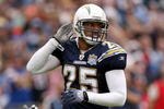SAN DIEGO - DECEMBER 20:  Safety Kevin Ellison #25 of the San Diego Chargers celebrates his sack during the game with the Cincinnati Bengals on December 20, 2009 at Qualcomm Stadium in San Diego, California.  The Chargers won 27-24.  (Photo by Stephen Dunn/Getty Images)