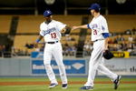 LOS ANGELES, CA - SEPTEMBER 14:  Orlando Hudson (L) #13 of the Los Angeles Dodgers congratulates Jon Garland #21 against the Pittsburgh Pirates at Dodger Stadium on September 14, 2009 in Los Angeles, California.  (Photo by Jeff Gross/Getty Images)