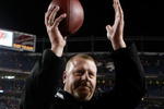 DENVER - DECEMBER 20:  Oakland Raiders head coach Tom Cable celebrates a victory over the Denver Broncos at Invesco Field at Mile High on December 20, 2009 in Denver, Colorado. The Raiders defeated the Broncos 20-19.  (Photo by Jeff Gross/Getty Images)