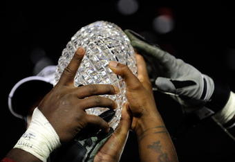 PASADENA, CA - JANUARY 07:  The Alabama Crimson Tide celebrate with the BCS Championship trophy after winning the Citi BCS National Championship game over the Texas Longhorns at the Rose Bowl on January 7, 2010 in Pasadena, California. The Crimson Tide defeated the Longhorns 37-21.  (Photo by Kevork Djansezian/Getty Images)