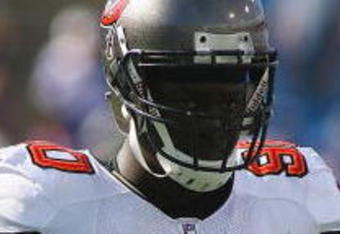 ORCHARD PARK, NY - SEPTEMBER 20:  Defensive end Gaines Adams #90 of the Tampa Bay Buccaneers takes a break from the action during the game against the Buffalo Bills at Ralph Wilson Stadium on September 20, 2009 in Orchard Park, New York.  The Bills won 33-20.  (Photo by Rick Stewart/Getty Images)