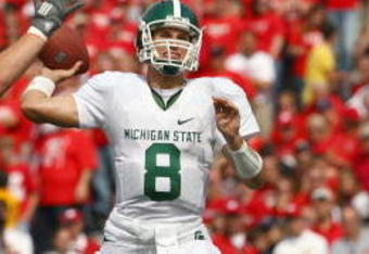 MADISON, WI - SEPTEMBER 26: Kirk Cousins #8 of the Michigan State Spartans looks to pass the ball against the Wisconsin Badgers on September 26, 2009 at Camp Randall Stadium in Madison, Wisconsin. (Photo by Jonathan Daniel/Getty Images)