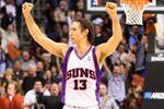 PHOENIX - DECEMBER 28:  Steve Nash #13 of the Phoenix Suns celebrates after scoring against the Los Angeles Lakers during the NBA game at US Airways Center on December 28, 2009 in Phoenix, Arizona. The Suns defeated the Lakers 118-103. NOTE TO USER: User expressly acknowledges and agrees that, by downloading and or using this photograph, User is consenting to the terms and conditions of the Getty Images License Agreement.  (Photo by Christian Petersen/Getty Images)